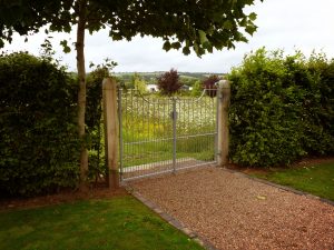 Garden gate to wild flower meadow